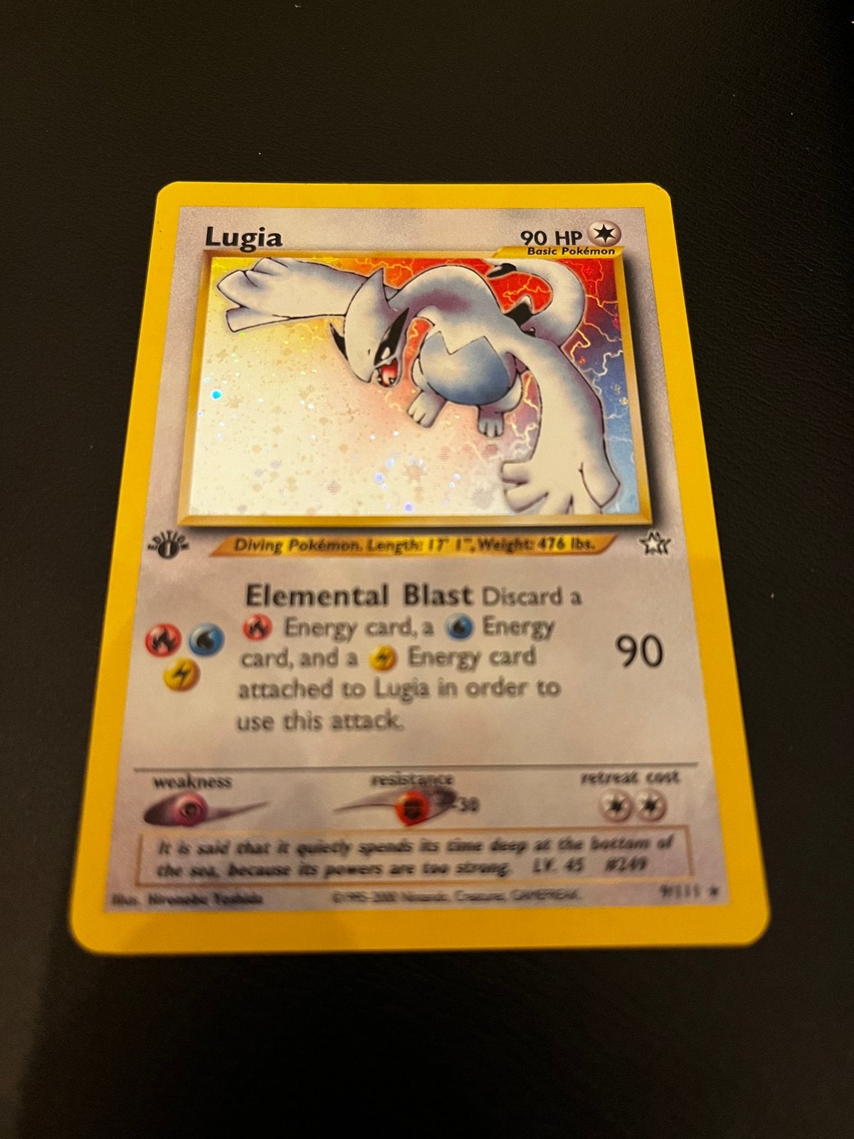 Lugia first edition 9/111 Neo Genesis Pokémon - prachtig!, Hobby en Vrije tijd, Ophalen of Verzenden, Zo goed als nieuw, Losse kaart