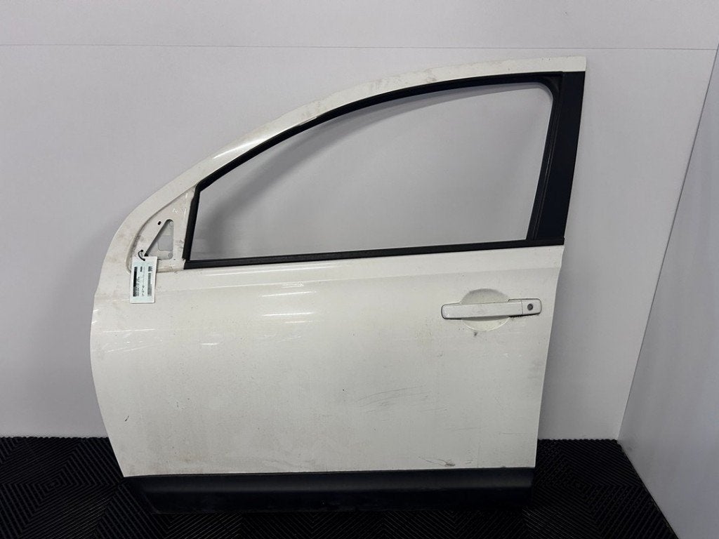 PORTIER LINKS VOOR Nissan Qashqai (J10) (11-2006/01-2014), Gebruikt, Deur, Voor, Germany@nissan-services.eu
