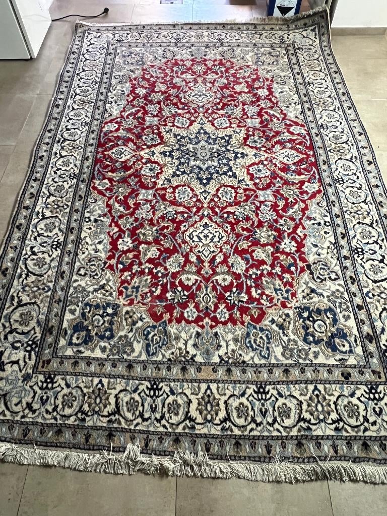 Tapis persan Nain, Enlèvement