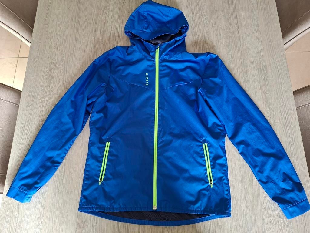 Fel blauwe regenjas Kipsta Decathlon 152/158, Jongen of Meisje, Decathlon, Ophalen of Verzenden, Zo goed als nieuw