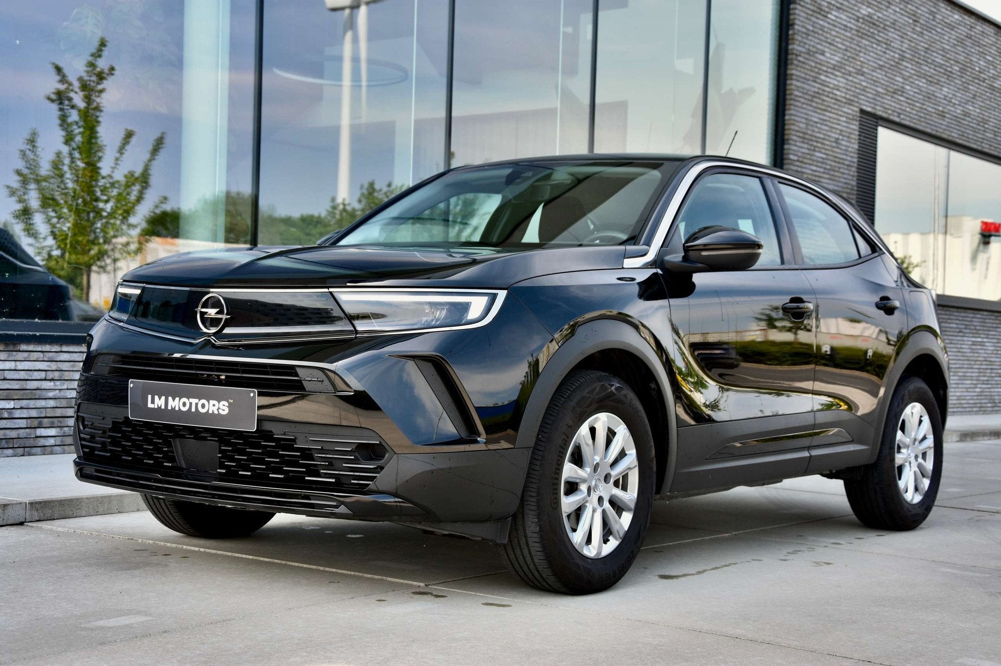 Opel Mokka Mokka 1.2 Turbo Edition S/S (bj 2022), Auto's, Opel, Voorwielaandrijving, Gebruikt, Zwart, https://public.car-pass.be/vhr/587bd6eb-f523-4380-8ce3-9dc2a3f5875b