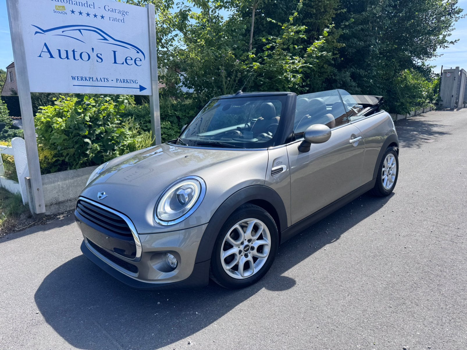 MINI Cooper Cabrio head up/bi-xenon/camera/gps/leder/HKsound, Auto's, 4 zetels, Euro 6, Leder, 119 g/km