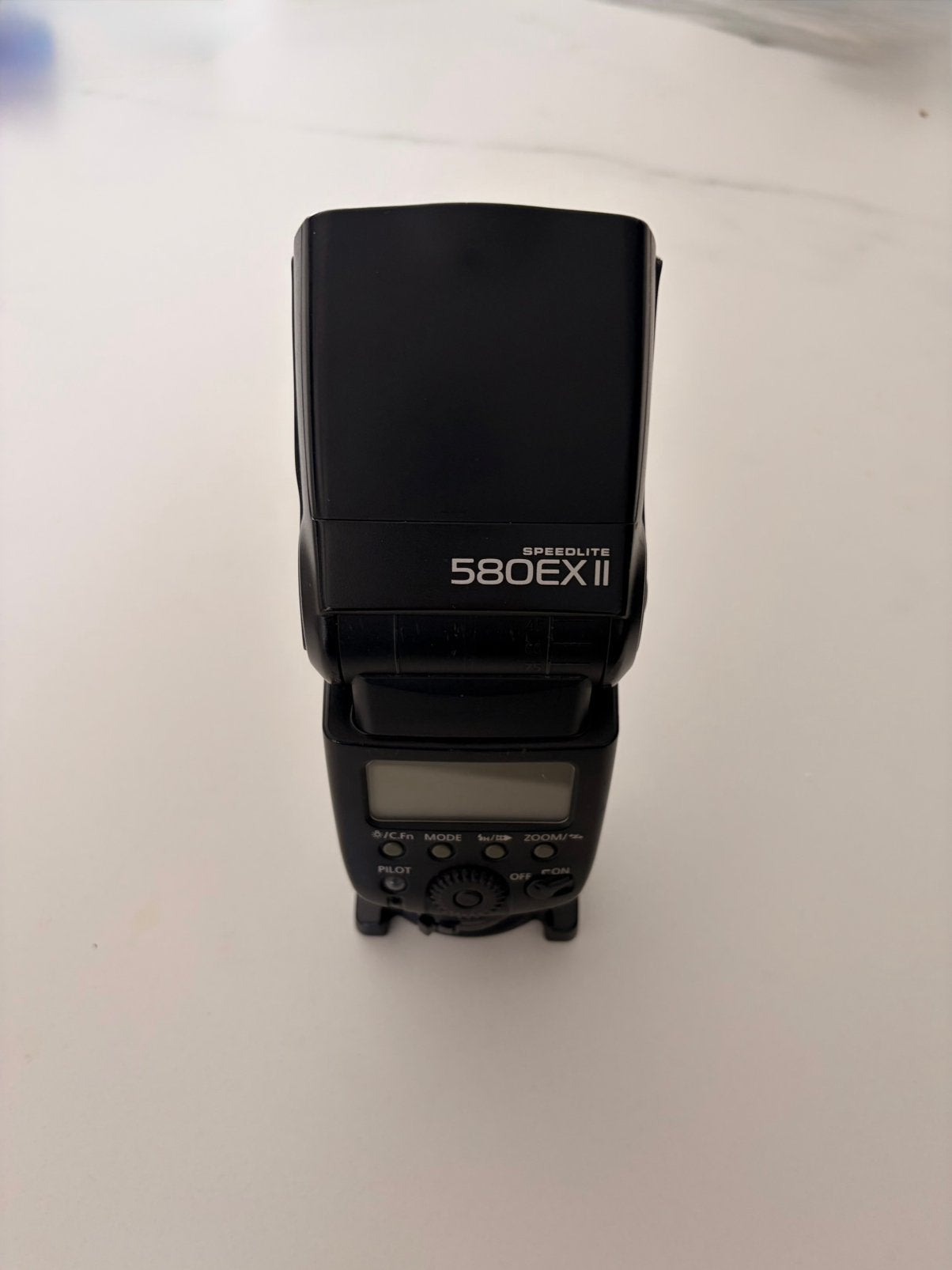 Canon speedlite 580 EXII, Audio, Tv en Foto, Foto | Flitsers, Ophalen of Verzenden, Gebruikt, Canon, Kantelbaar