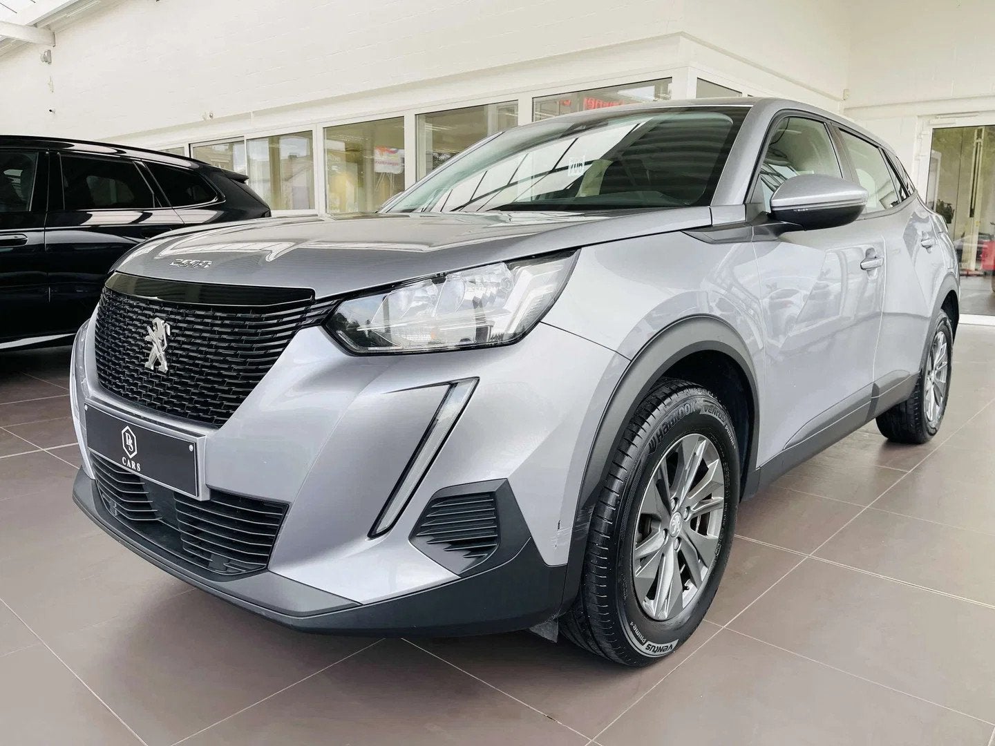 Peugeot 2008 1.2i * GARANTIE + CAMERA + GPS * (bj 2021), Auto's, Automaat, Stof, Gebruikt, Euro 6