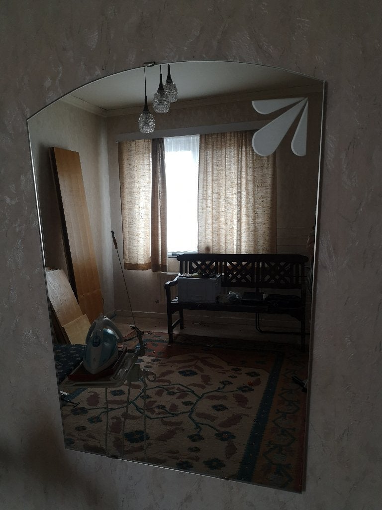 Miroir à dessus rond, Enlèvement