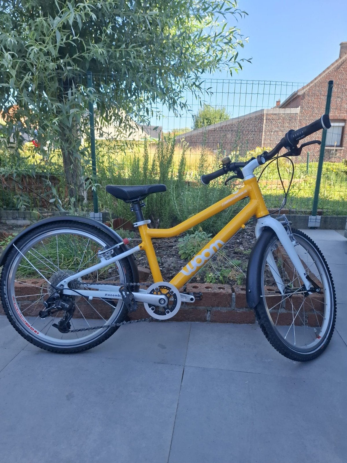woom 4, Fietsen en Brommers, Ophalen