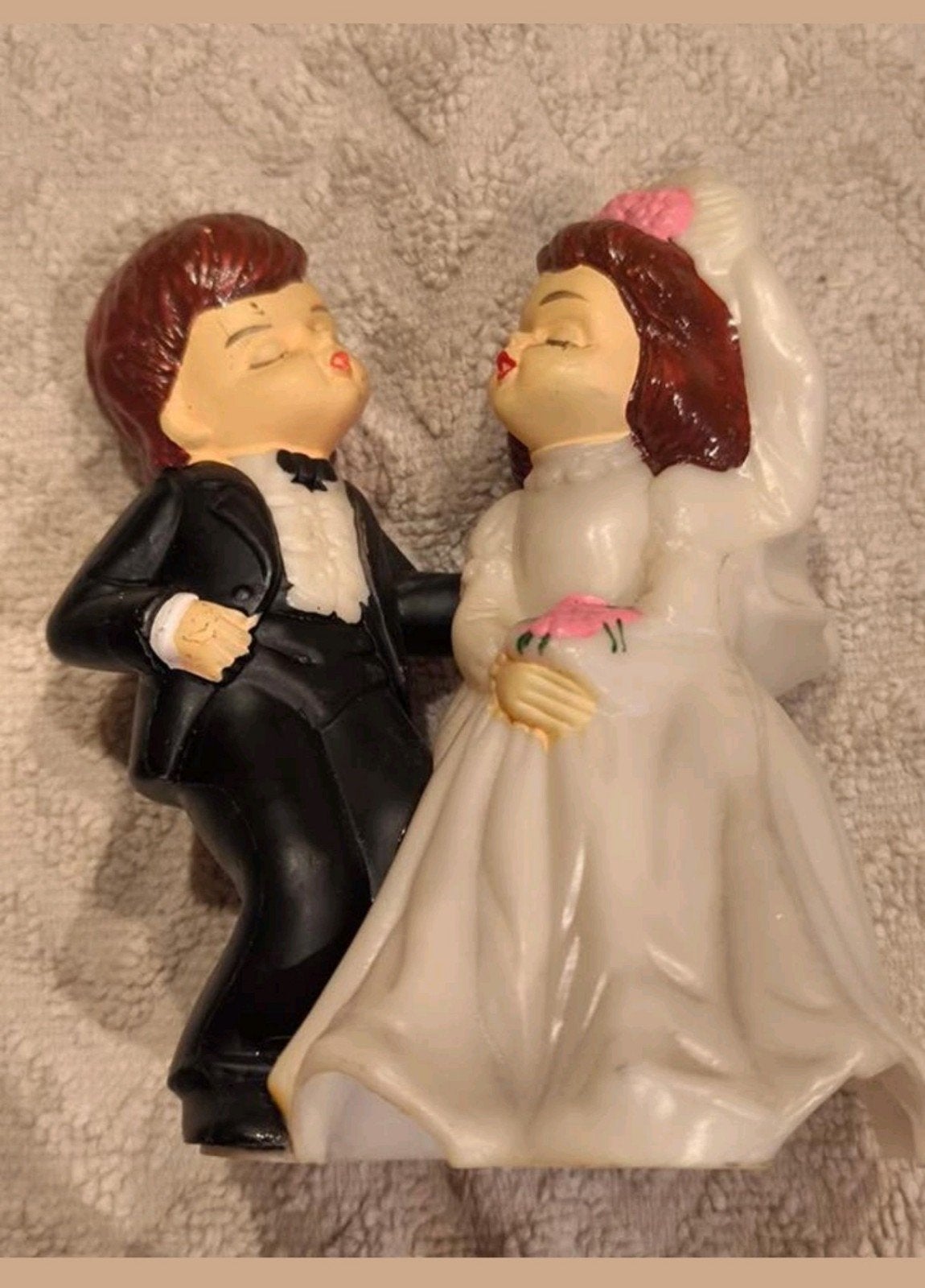 Figuurtje huwelijkstaart, Ophalen