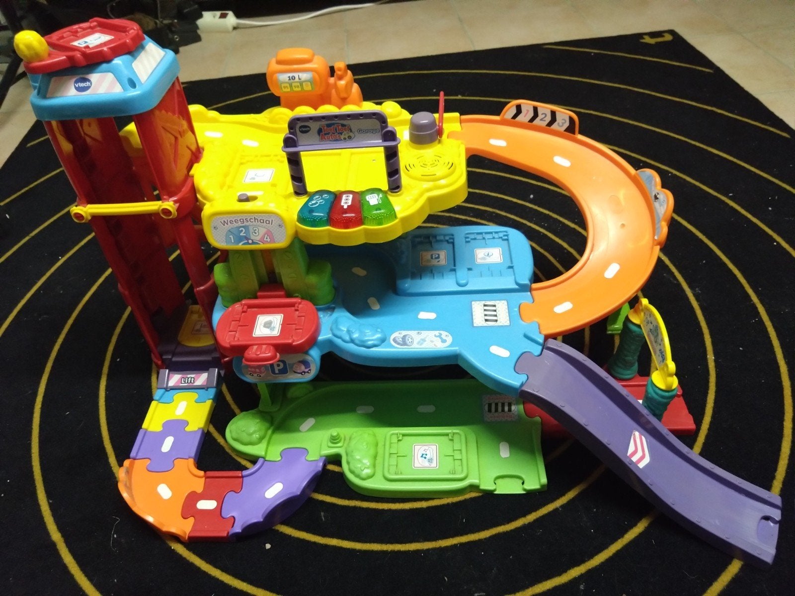 VTech Toet Toet autogarage en 2 autos, Ophalen, Zo goed als nieuw, 2 tot 4 jaar