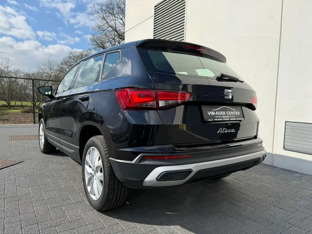 SEAT Ateca 1.5TSI STYLE 150PK DSG (bj 2023, automaat), Auto's, Seat, Automaat, 4 cilinders, Zwart, Bedrijf