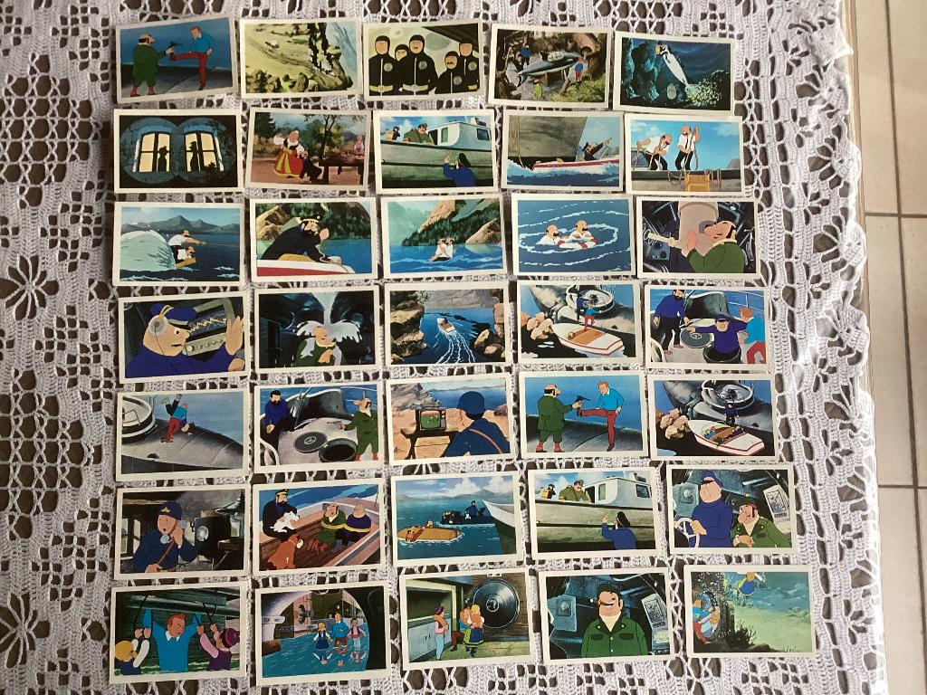 74 prenten chromos KUIFJE en het haaienmeer Vanderhout 1973, Ophalen of Verzenden, Kuifje, Gebruikt