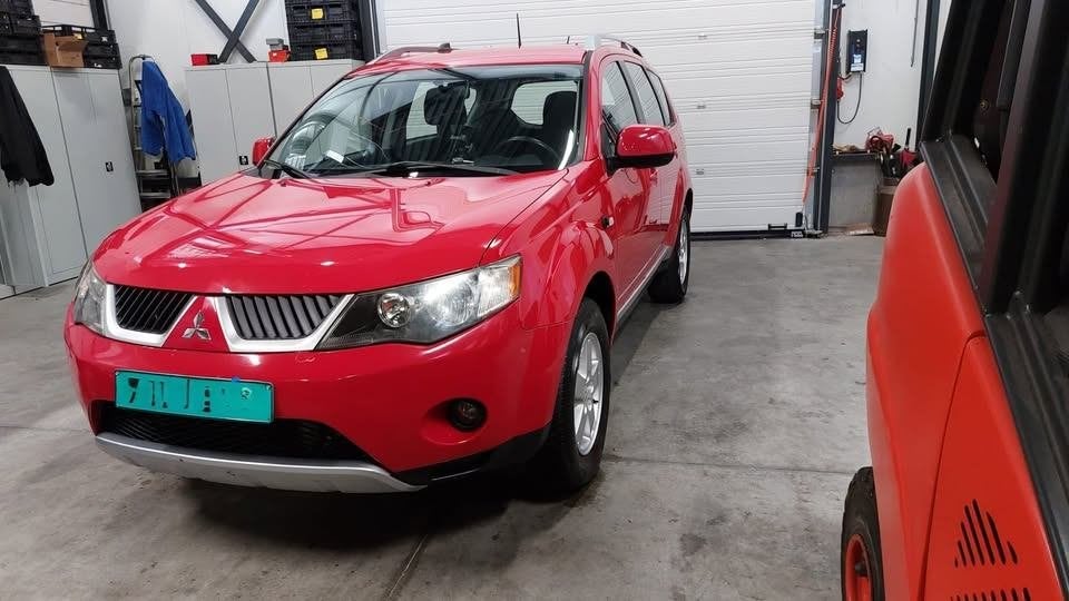 Mitsubishi Outlander 4x4, Airco, Auto's, Mitsubishi, Outlander, Zwart, 4 cilinders, Leder en Stof