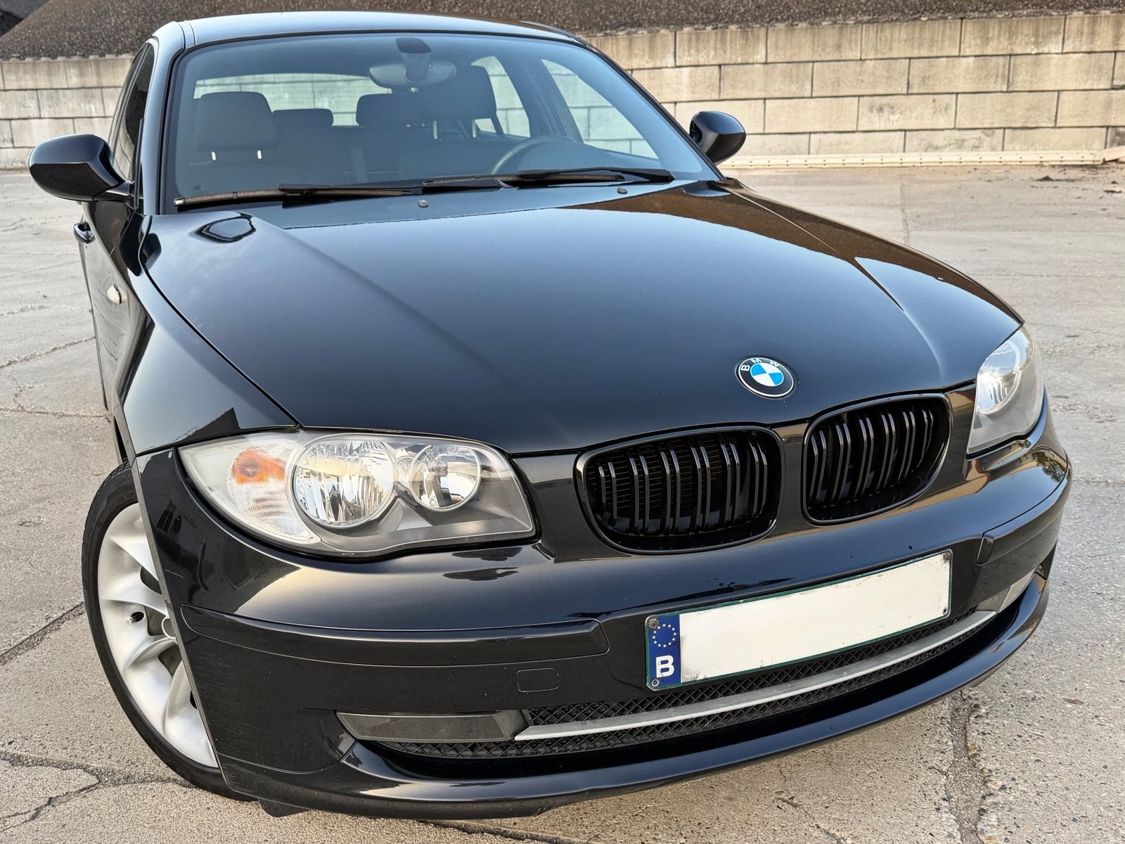 BMW 116i benzine - 120.000km - bj 2010 Euro 5 Blanco Geleurd, Autos, BMW, Euro 5, Achat, Boîte manuelle, Noir