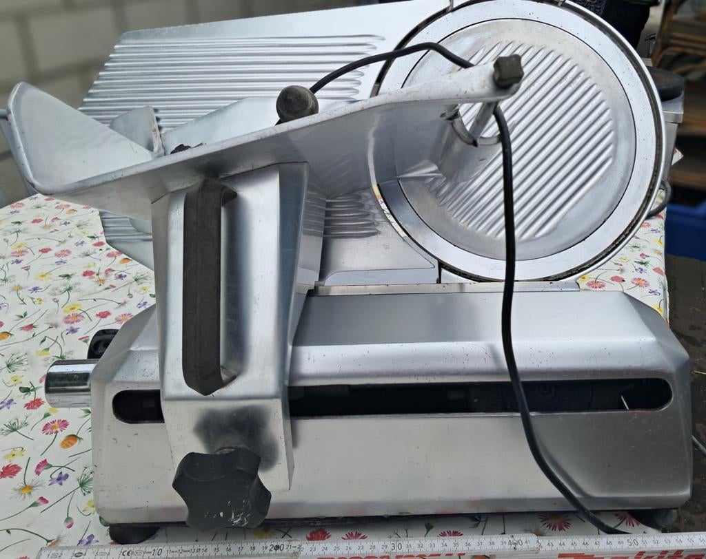 Snijmachine, Ophalen