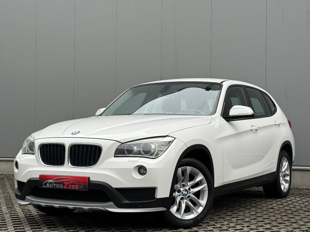 BMW X1 2.0 dA sDrive18 Xenon Camera Cruise Navi DigAirco, Auto's, Euro 5, 1995 cc, Zwart, Wit