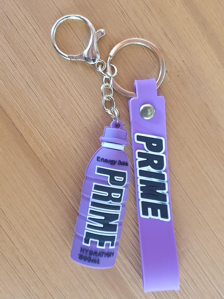 Paarse sleutelhanger drinkfles Prime energiedrank, Ophalen of Verzenden, Nieuw