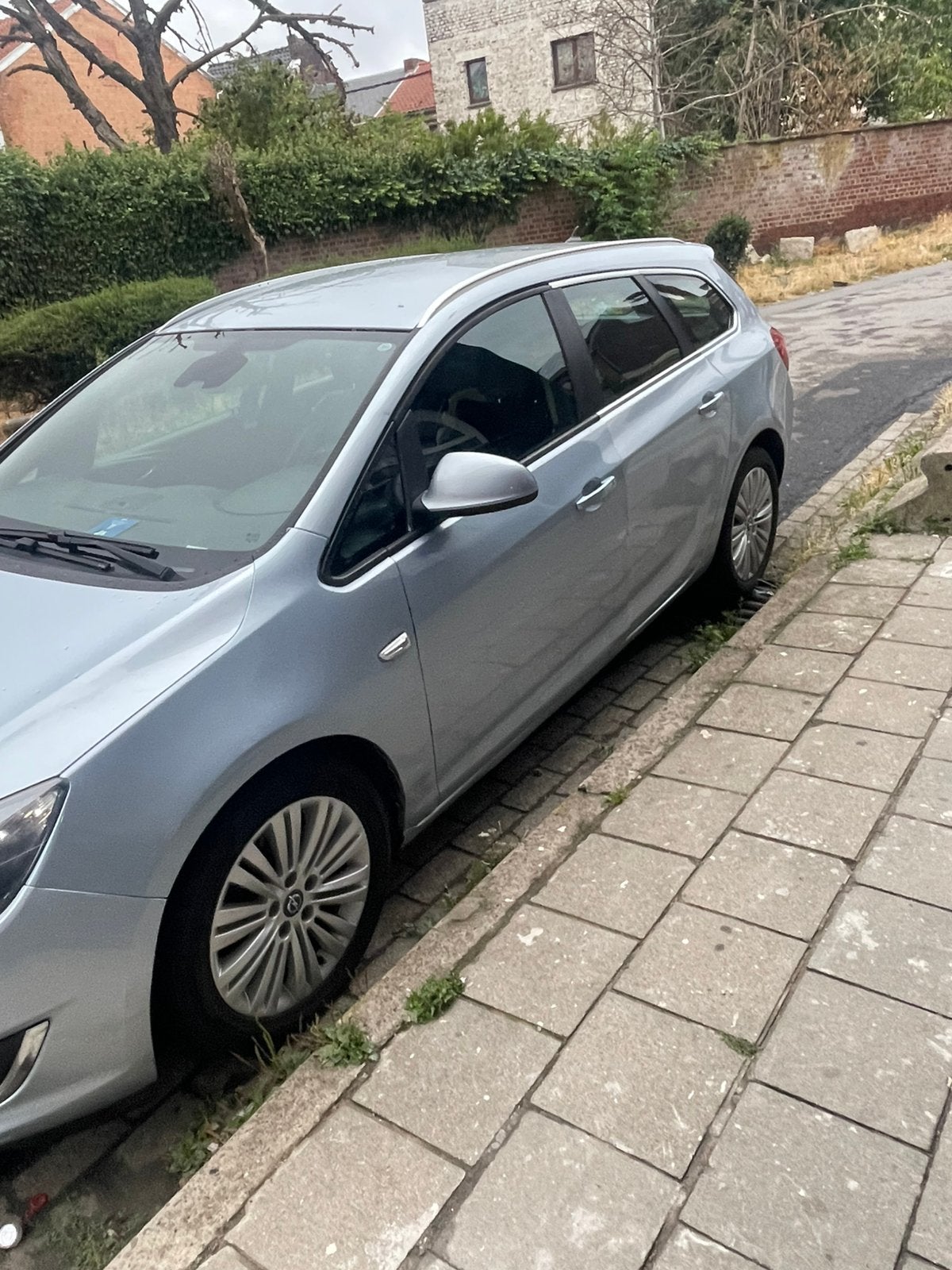 Opel Astra Sports Tourer stationwagen uit 2014, Auto's, Voorwielaandrijving, Euro 5, Zwart, 4 cilinders