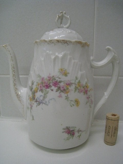 Porseleinen koffiepot, Enlèvement