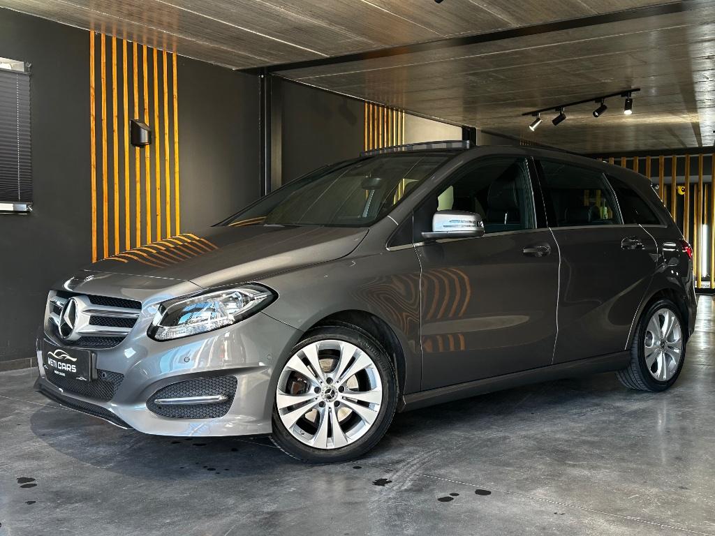 Mercedes-Benz B 180 7G-DCT | Pano | Stoelverwarming | Trekh., Auto's, Monovolume, Leder en Stof, 1595 cc, Zilver of Grijs