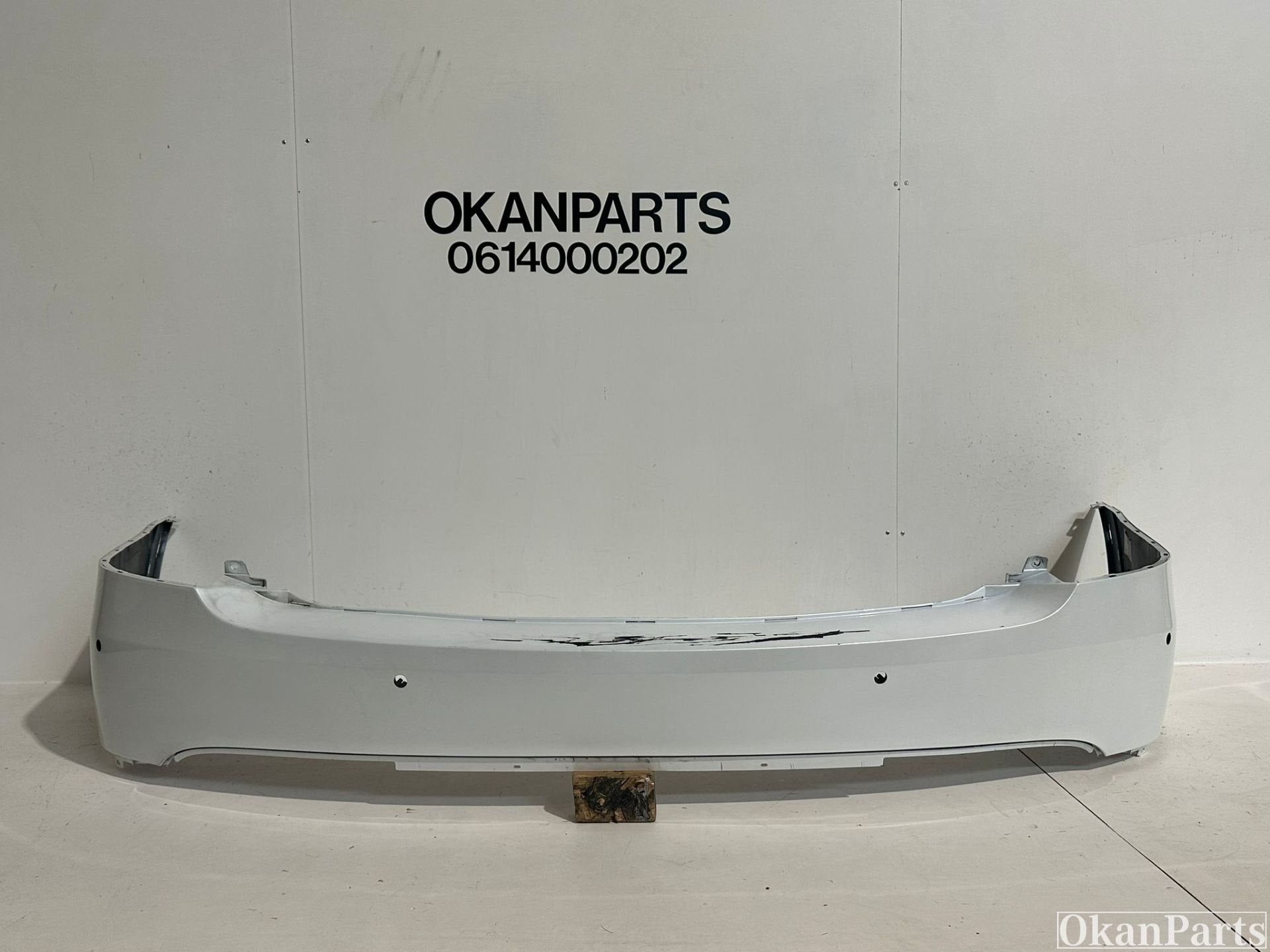 Tesla Model X achterbumper 1034804-00-C, Gebruikt, Achter, Bumper