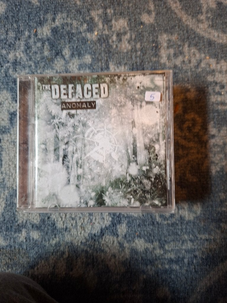 cd - the defaced - anomaly, Death metal, Enlèvement ou Envoi, Comprend un livret, Comme neuf