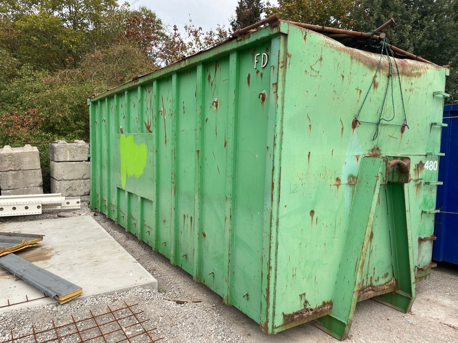 Container volume met klapnetten, Enlèvement