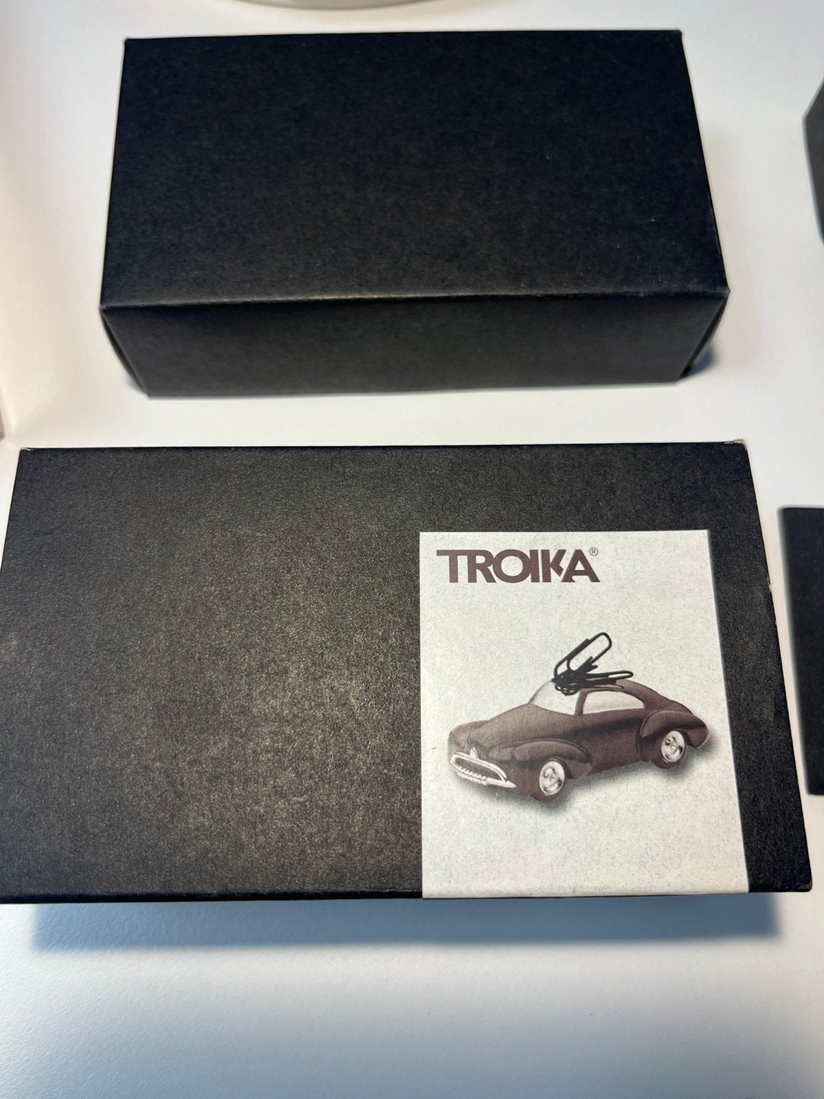 TROIKA objet presse papier design, Ophalen