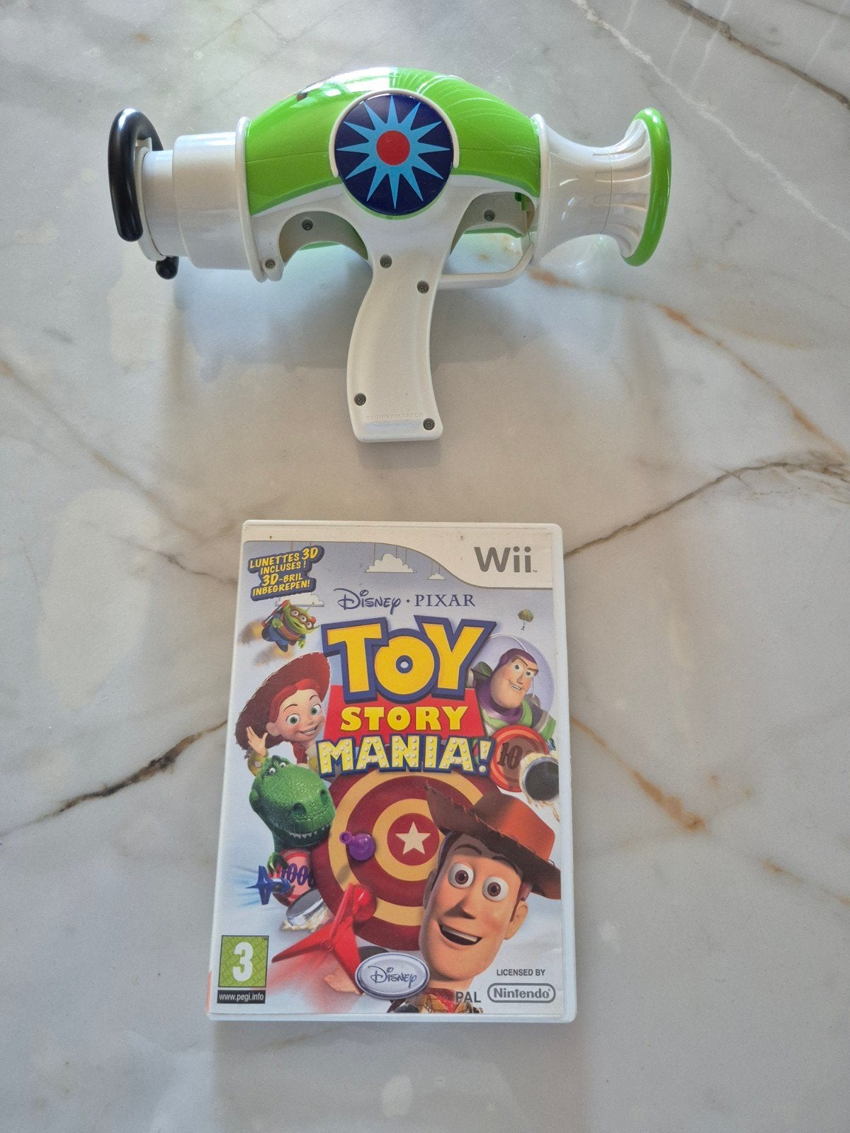 Wii Toy Story Game Mania + Ray Gun, Games en Spelcomputers, Ophalen of Verzenden, Gebruikt
