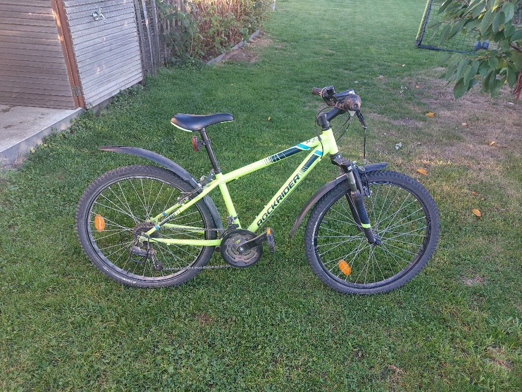 Stoere gele Decathlon Rockrider 24 inch Mountainbike 9-12 j, Ophalen, Velgrem, Rockrider (Decathlon), Handrem