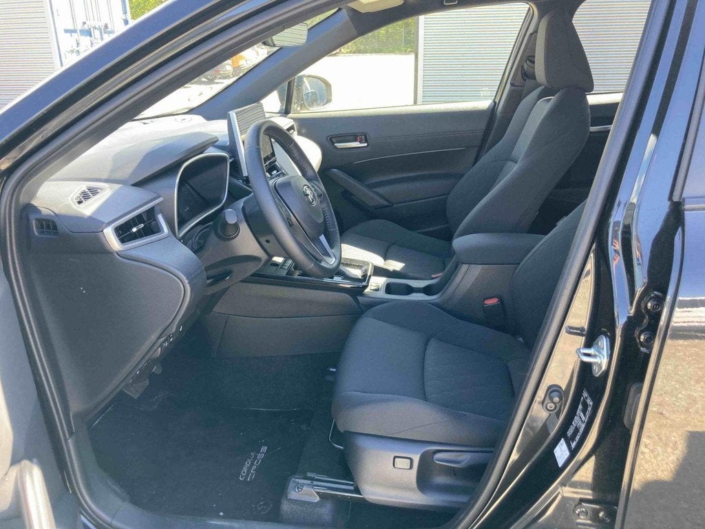 Toyota Corolla Cross 1.8 Hybrid Style | Achteruitrijcamera |, Auto's, Stof, Gebruikt, 750 kg, 4 cilinders