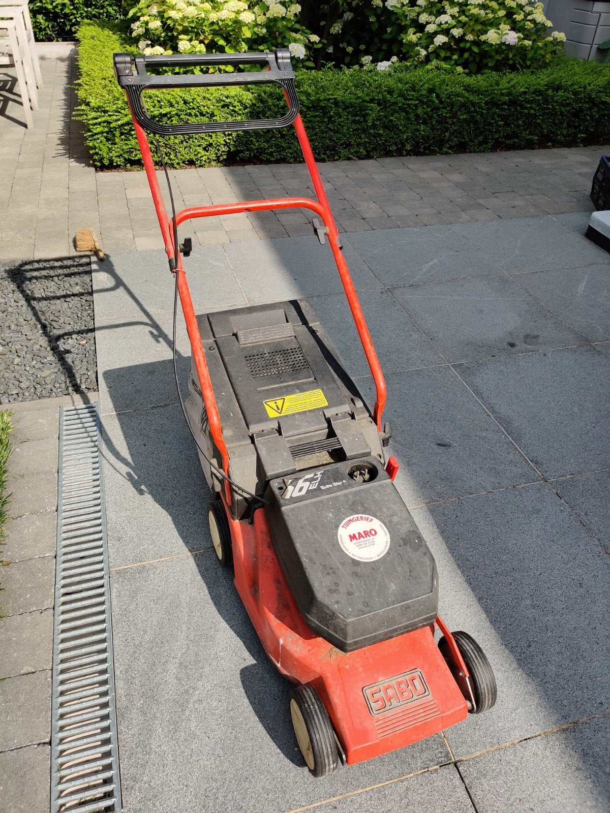 Electrische grasmaaier ., Ophalen