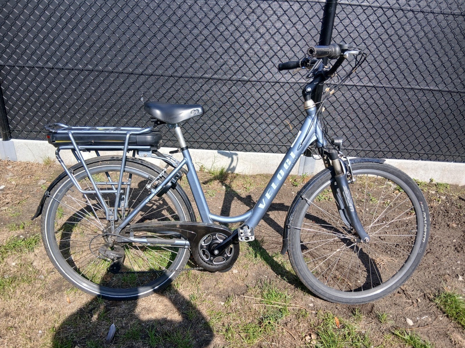 electrische fiets veloci  met kapote baterij, Ophalen