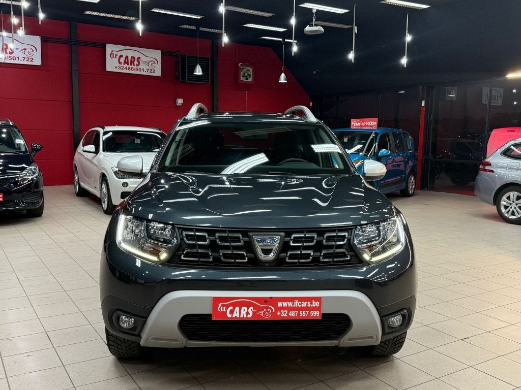 Duster 1.3 TCe 4WD Prestige**NAVIGATIE**CAMERA**4x4**, Auto's, Dacia, Stof, 4 cilinders, Duster, https://public.car-pass.be/vhr/b56d4ae7-387d-4759-b218-155b7709852a