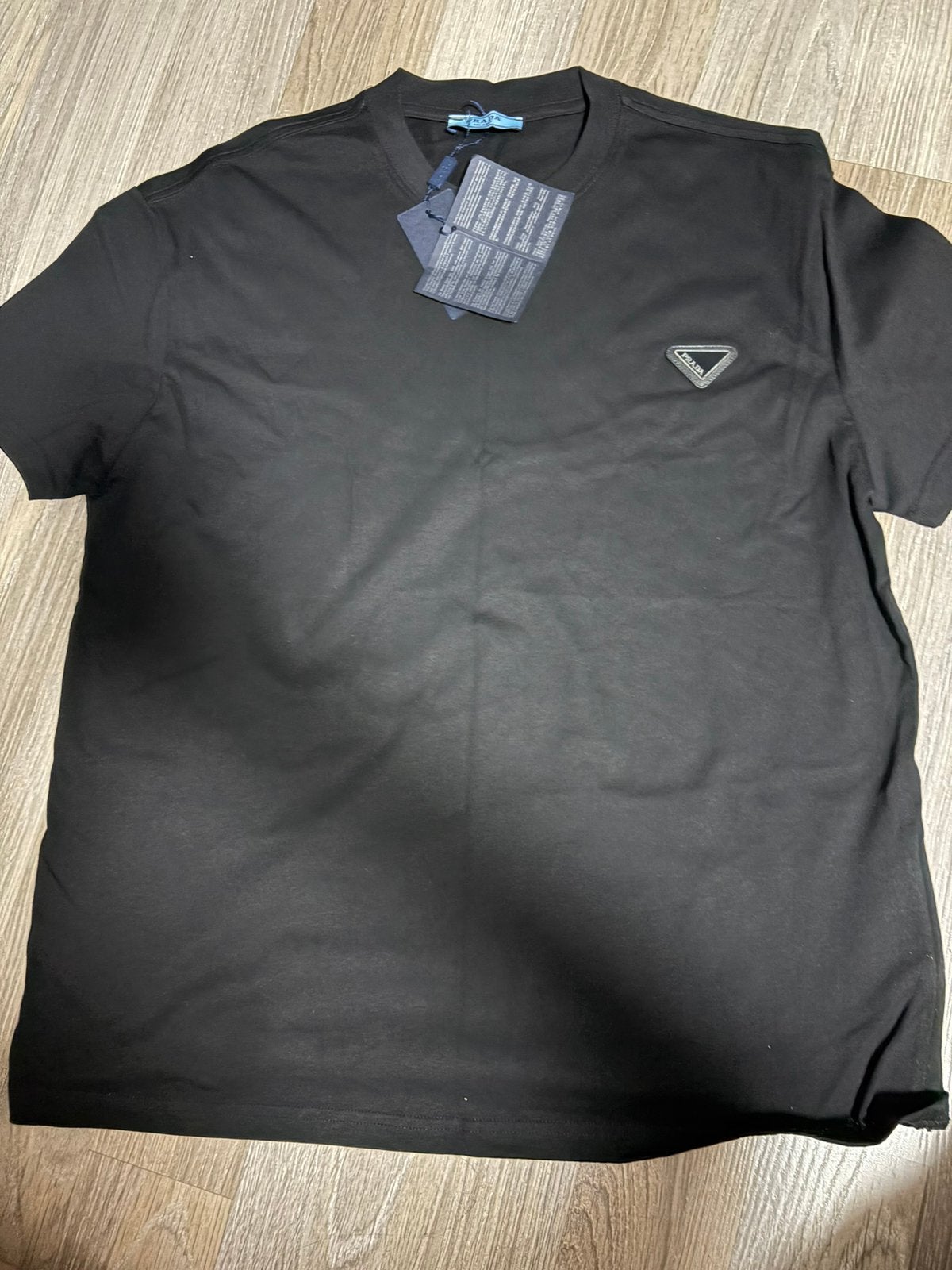 T-shirt van Prada, Ophalen of Verzenden, Zo goed als nieuw, Maat 52/54 (L), Zwart