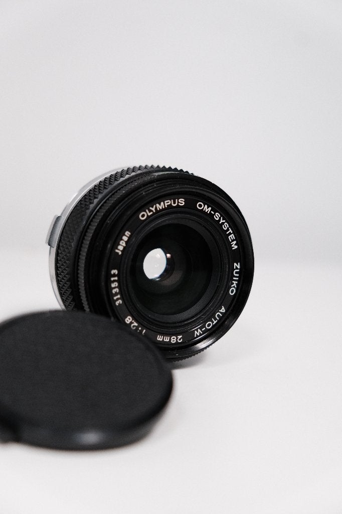 OLYMPUS OM-SYSTEM ZUIKO AUTO-W 1:2.8 28mm Wide Angle Lens, Olympus, Lensdoppen, 28 mm, Groothoeklens