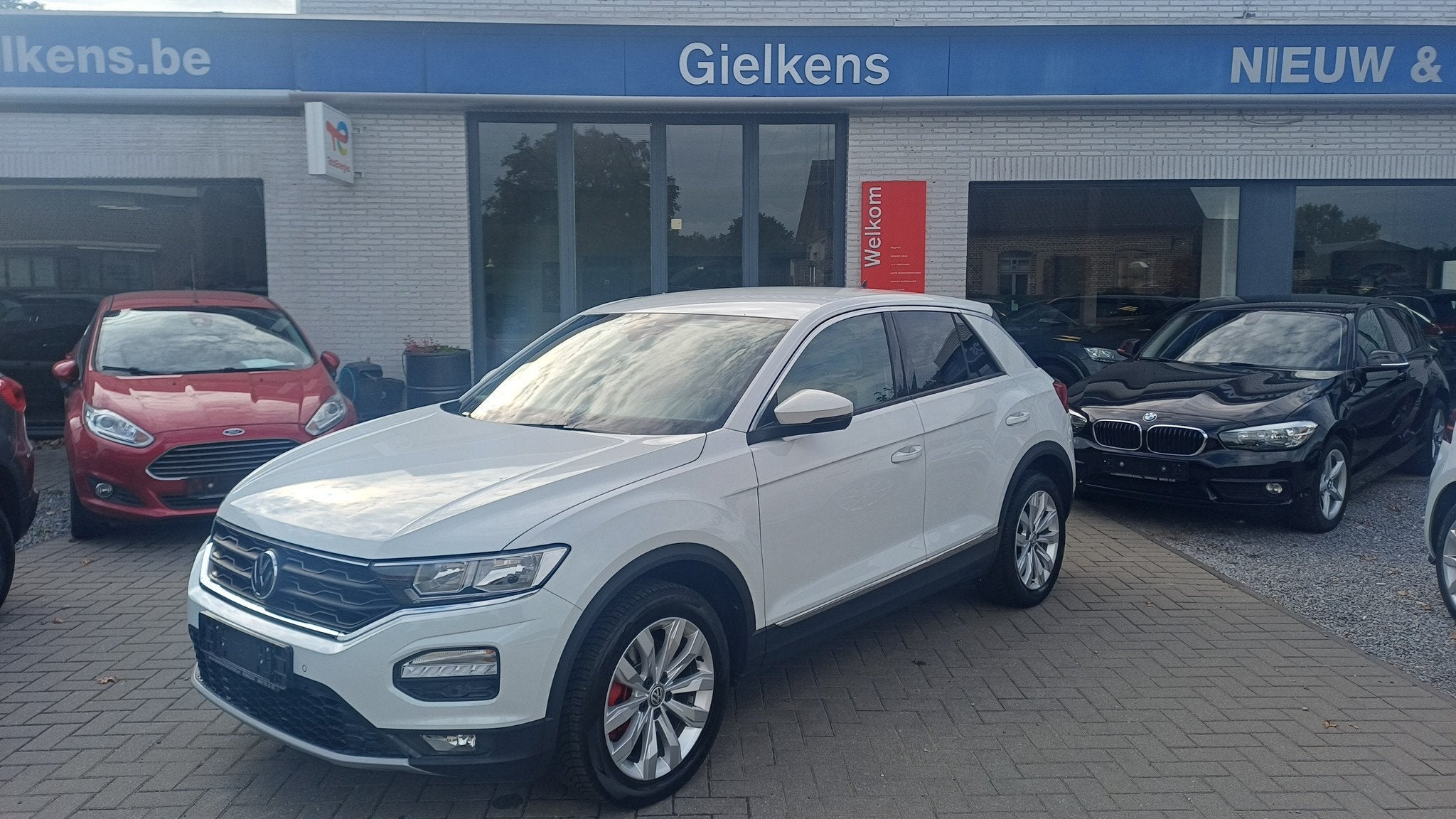 Volkswagen T-Roc 1.5Tsi 150pk /leder,zetelverw/1 j. garantie, Auto's, 4 cilinders, Wit, Leder, Bedrijf