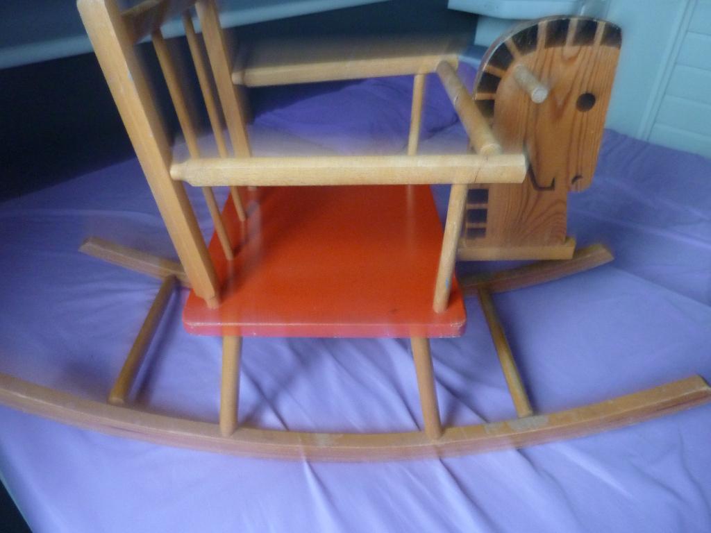 houten schommel of loopkever, Ophalen