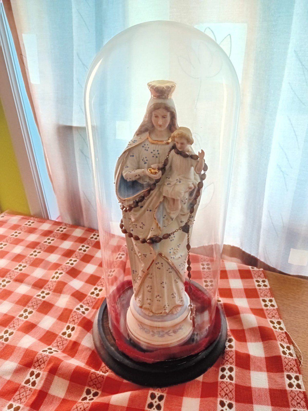 Maria beeldje met kindje Jezus met stolp, Ophalen