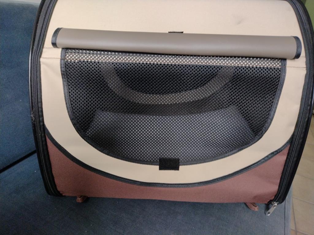 Draagbare overdekte mand voor huisdieren, Ophalen