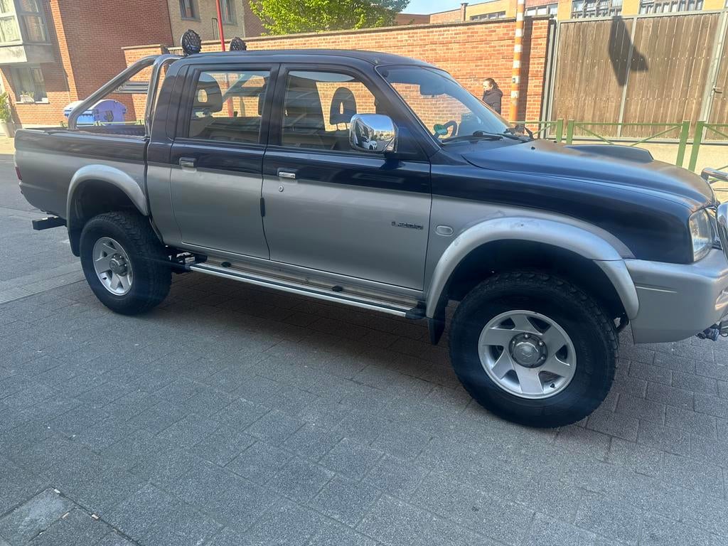 Mitsubishi L200 Automaat Clean 0485905657, Auto's, 4 deurs, Bedrijf, L200, SUV of Terreinwagen