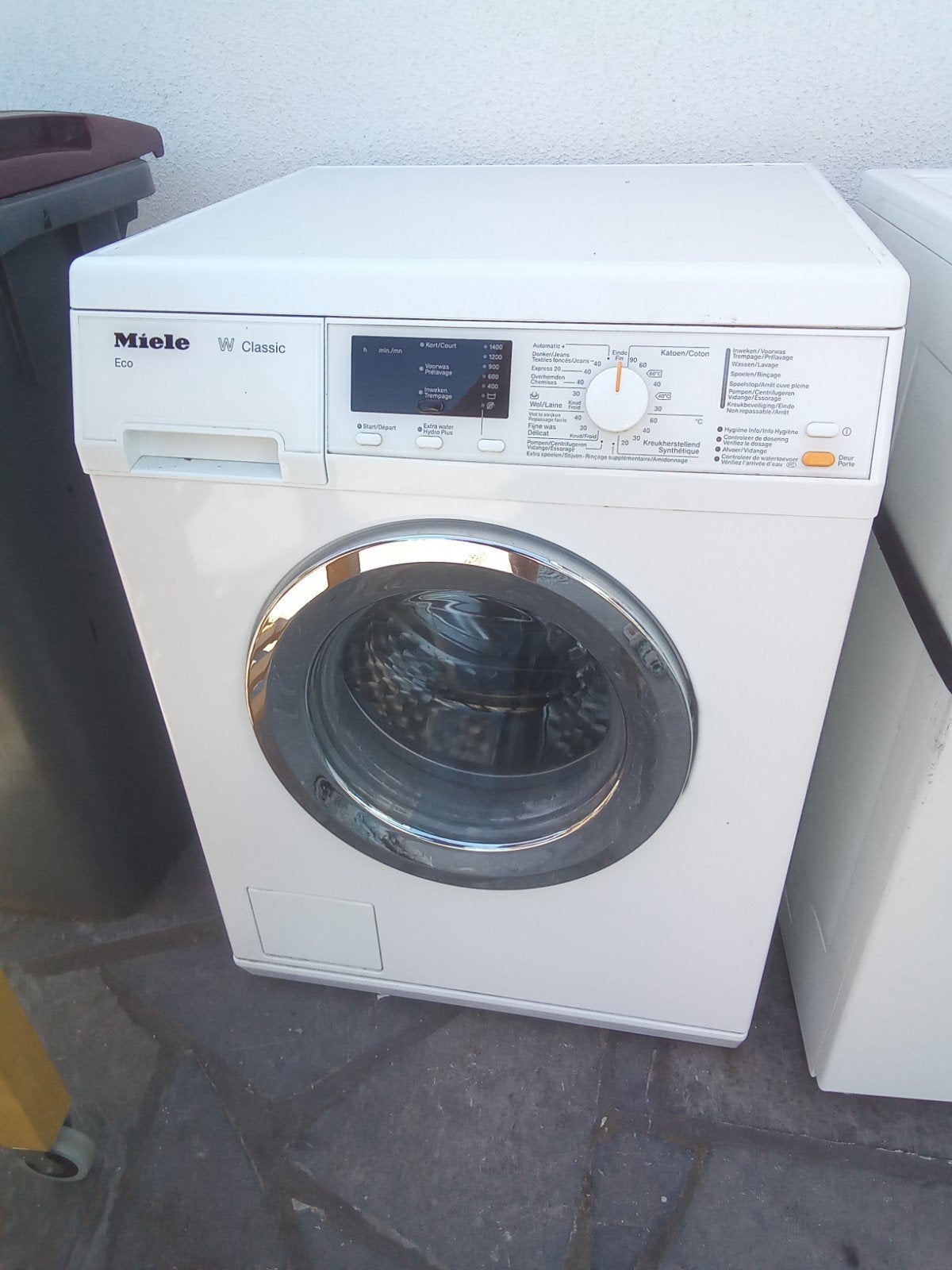 wasmachine Miele, Ophalen