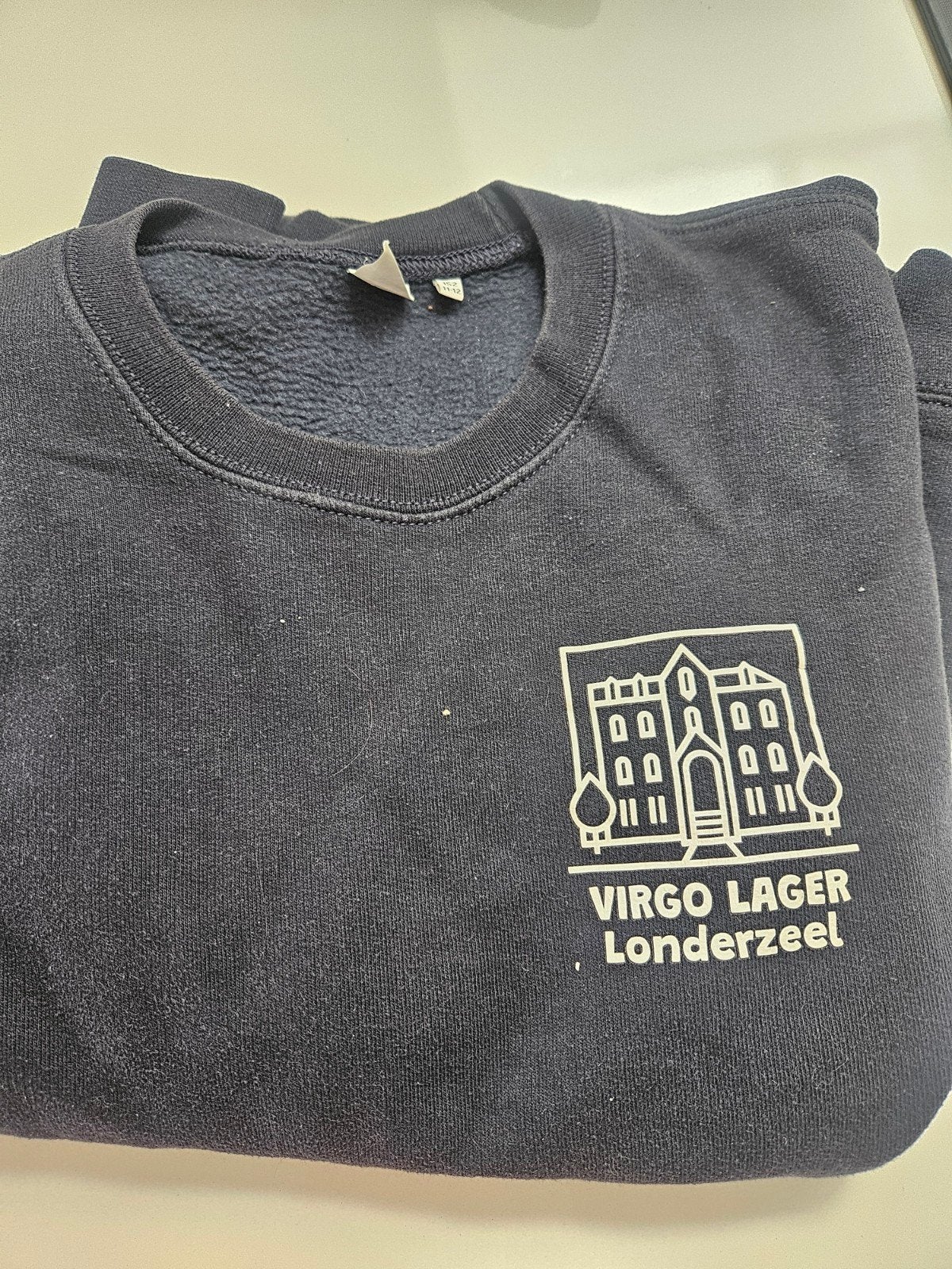 Virgo Sapiens lagere school trui, Ophalen, Gedragen
