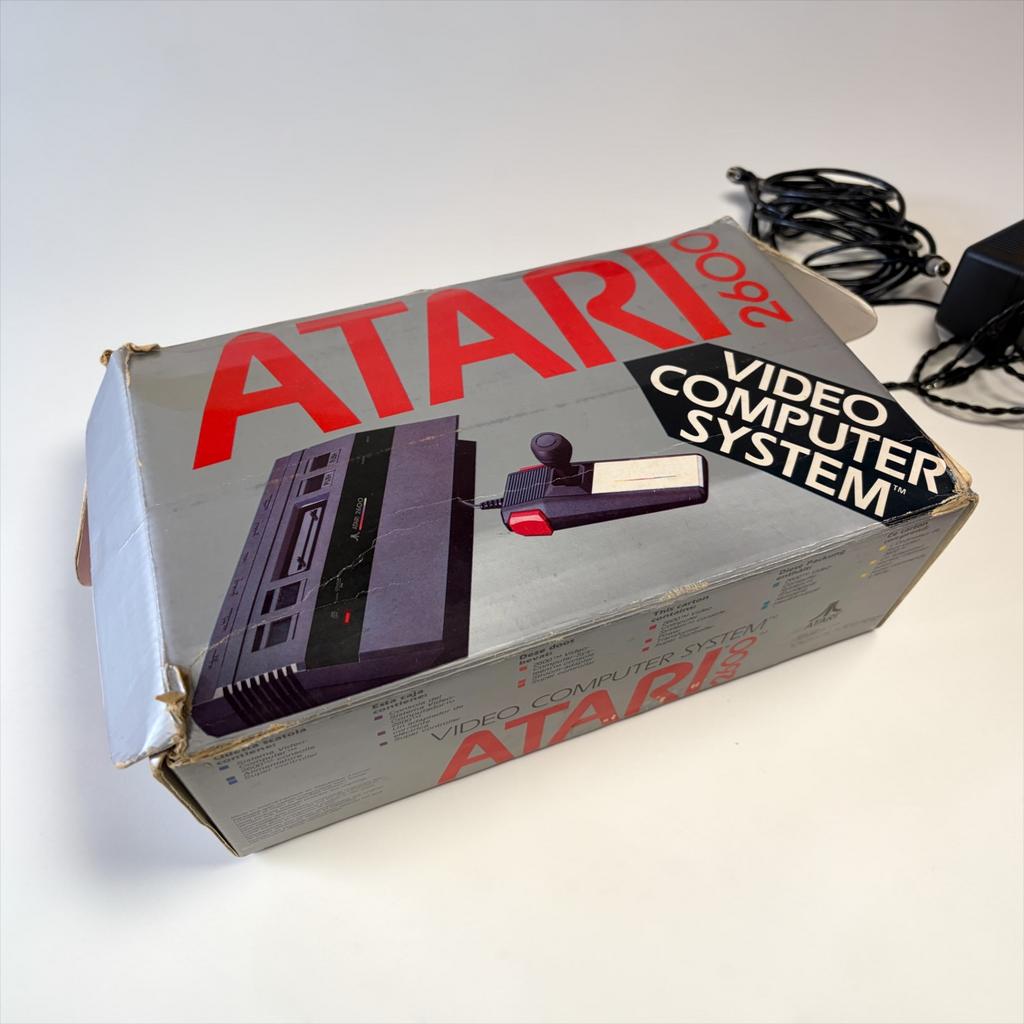 Console de jeu vidéo vintage ATARI 2600 avec boîte, Enlèvement