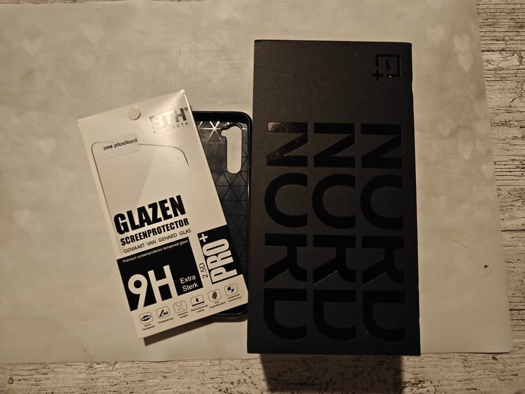 OnePlus Nord AC2003 met lader+nieuwe kbl+hoesje+screen prot, Telecommunicatie, Mobiele telefoons | Overige merken, Ophalen of Verzenden