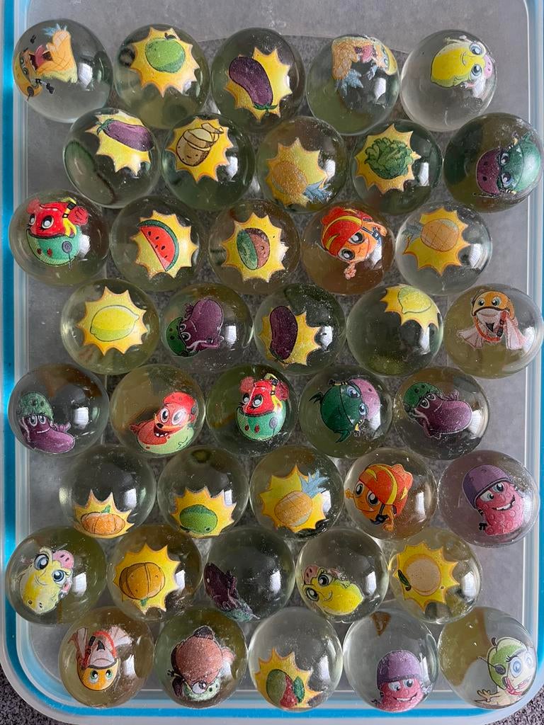 40 Fresh Heads knikkers + zakje, Kinderen en Baby's, Speelgoed | Overig, Ophalen of Verzenden