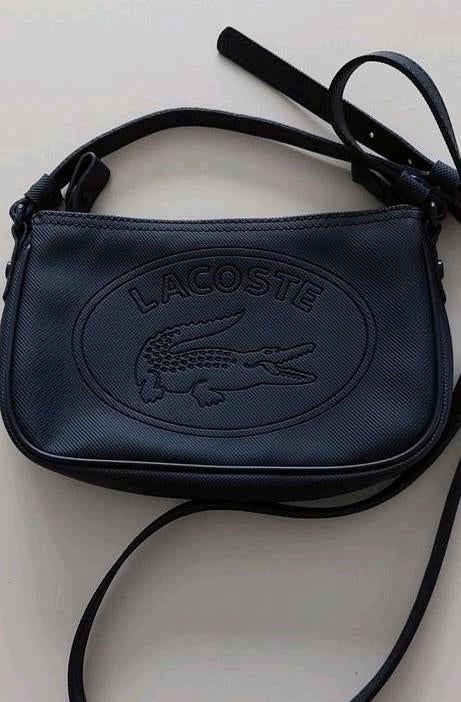 SCHOUDERTAS LACOSTE, Enlèvement ou Envoi, Comme neuf