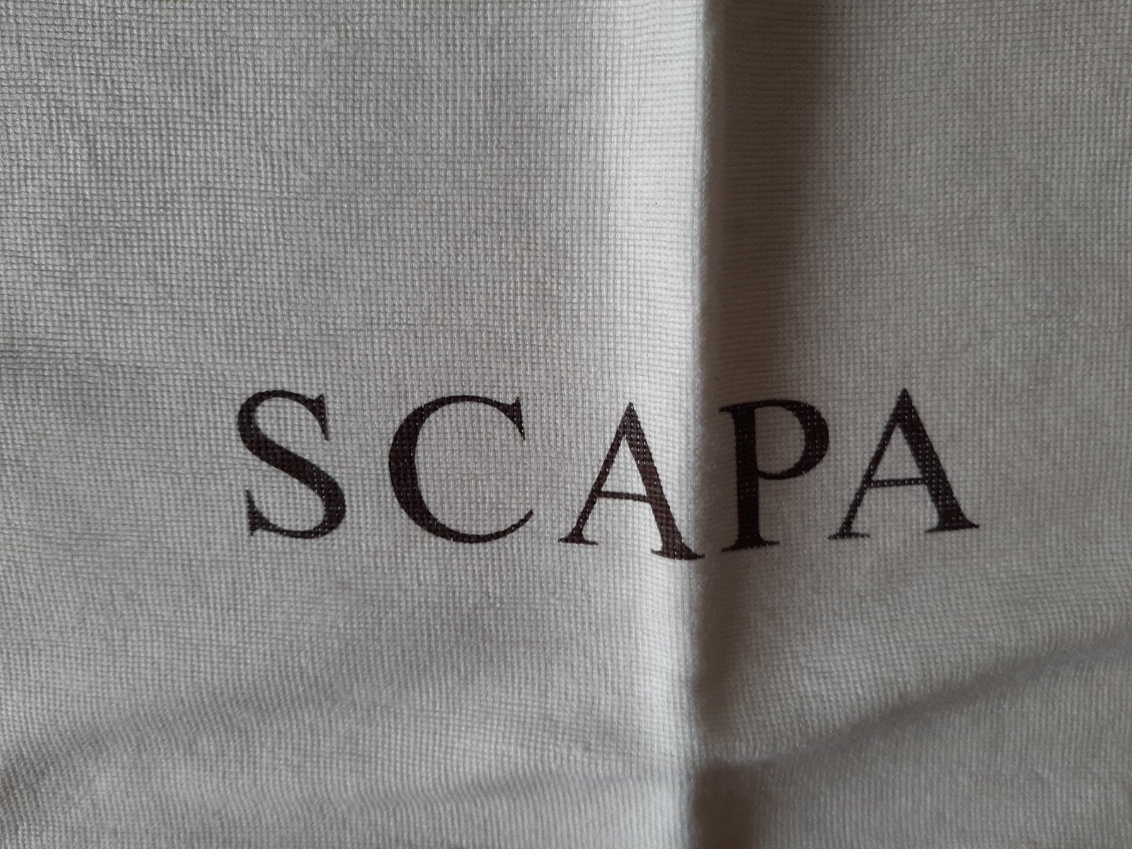 Opbergtas handtas Scapa, Ophalen