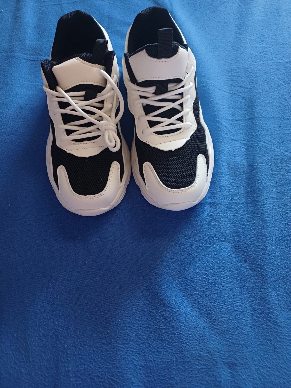 Sportschoenen maat 38, Ophalen