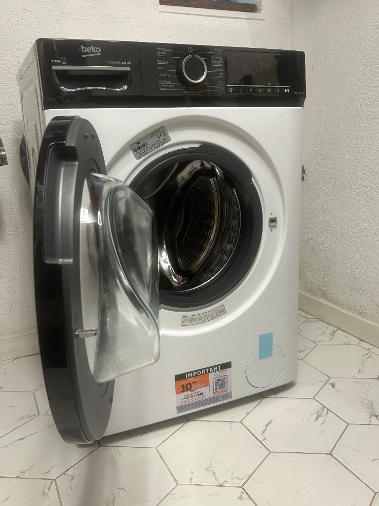 Wasmachine Beko B1W764BBBE SteamCure + 1.5 jaar garantie, Elektronische apparatuur, Ophalen, Zo goed als nieuw, Voorlader, Energieklasse A of zuiniger