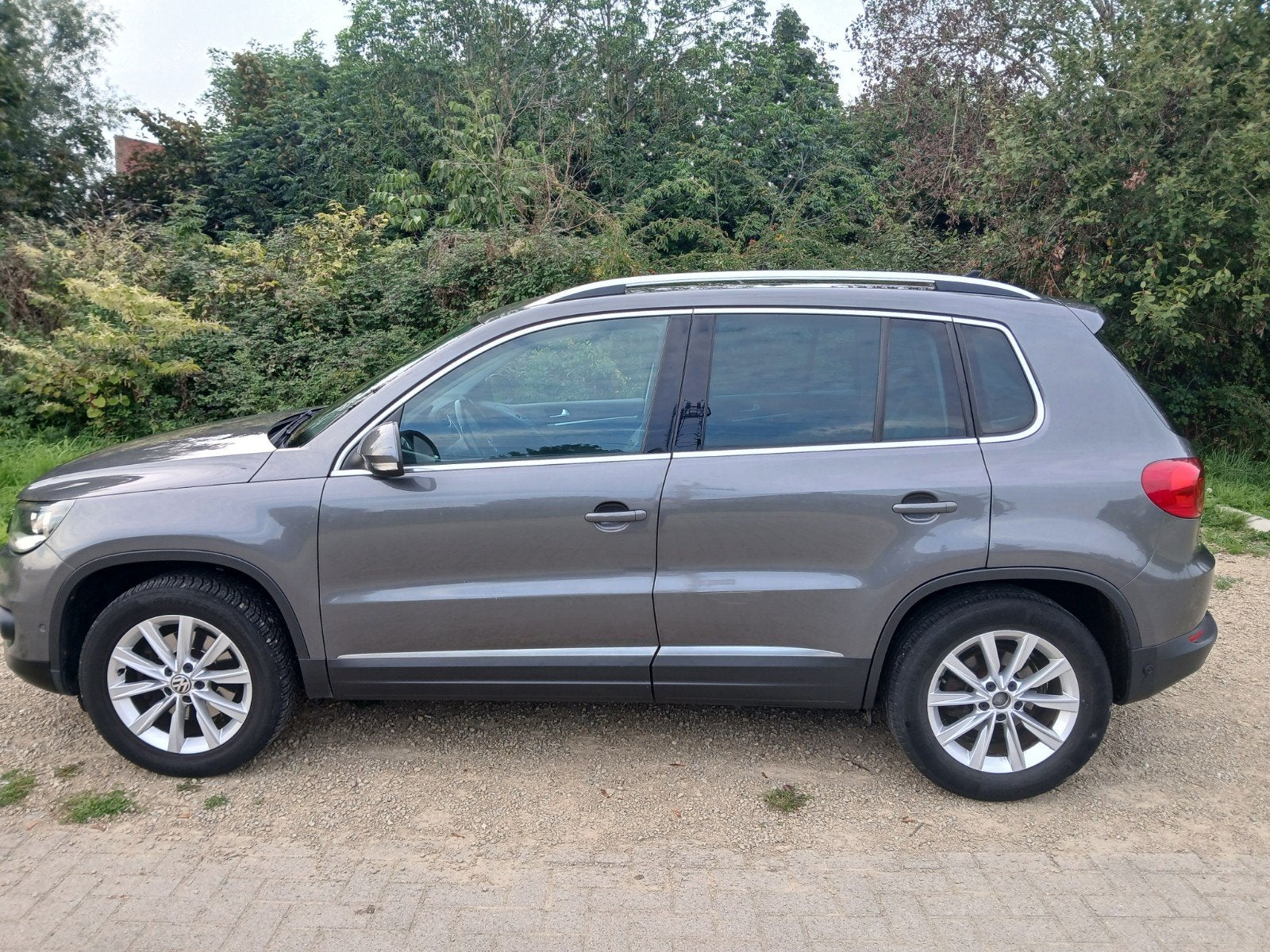 VW Tiguan 1.4 TSI Sport & Style | Leder | Pano | GPS, Autos, Achat, Boîte manuelle, Noir, 5 portes