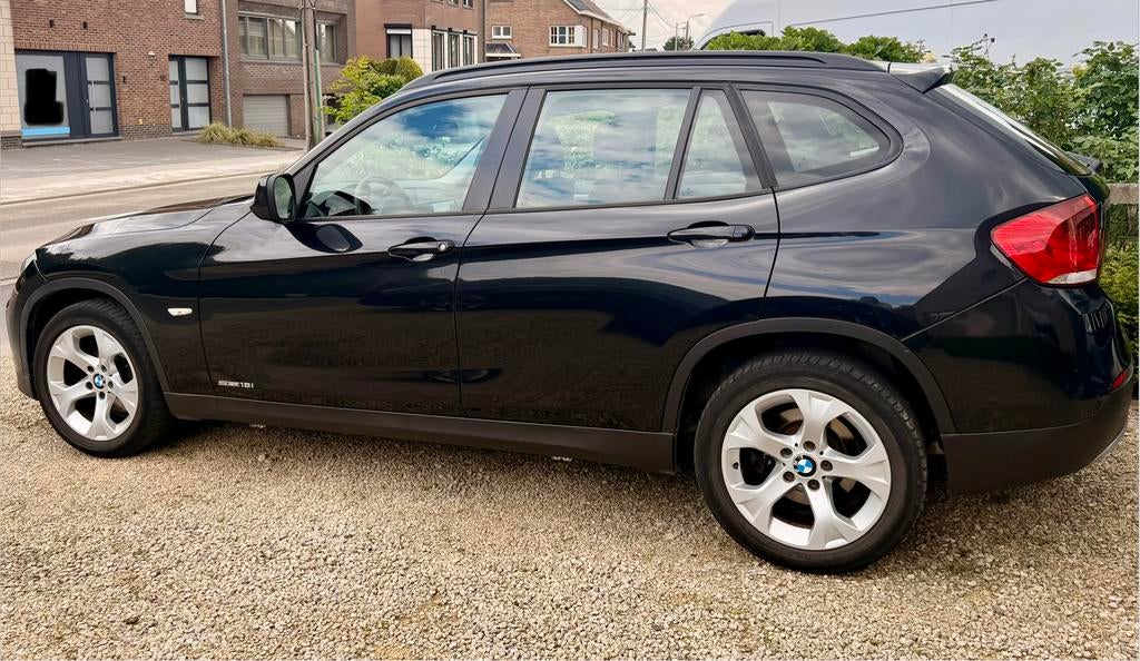 BMW X1 sDrive18i automaat benzine, Euro 5, Achterwielaandrijving, Zwart, Leder en Stof
